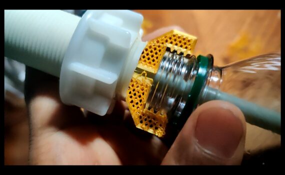 3d-printed adapter joins dispenser tube to water bottle